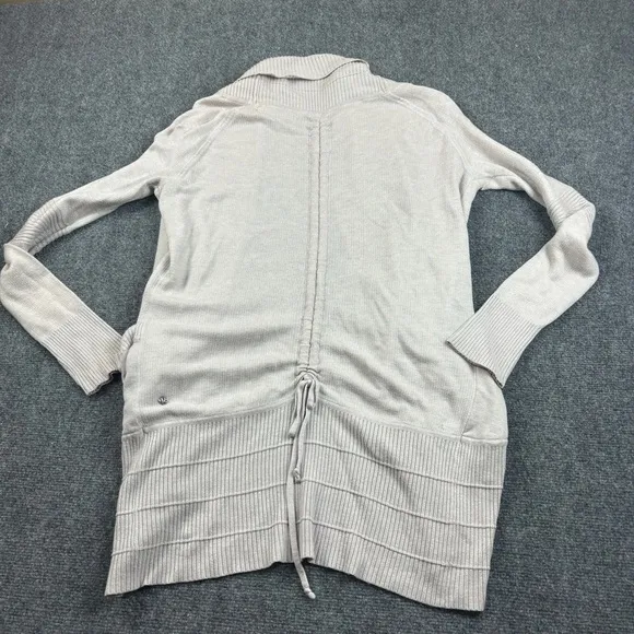 LULULEMON Women’s Blush Pink Transformation Wrap heathered dune/white size: 6